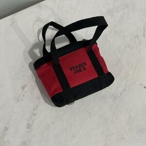 Trader Joe’s Micro tote with red reusable grocery bag